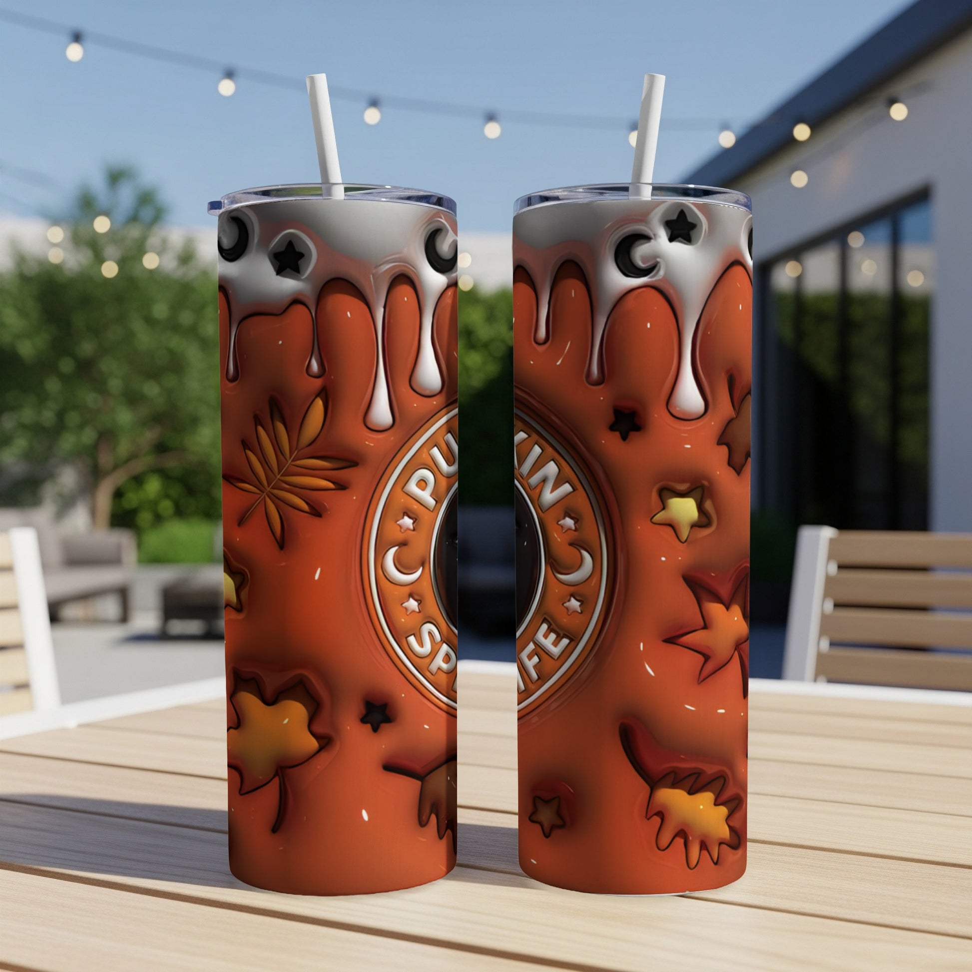 Orange tumbler with "Pumpkin Spice Cafe" text and autumn leaf motifs.