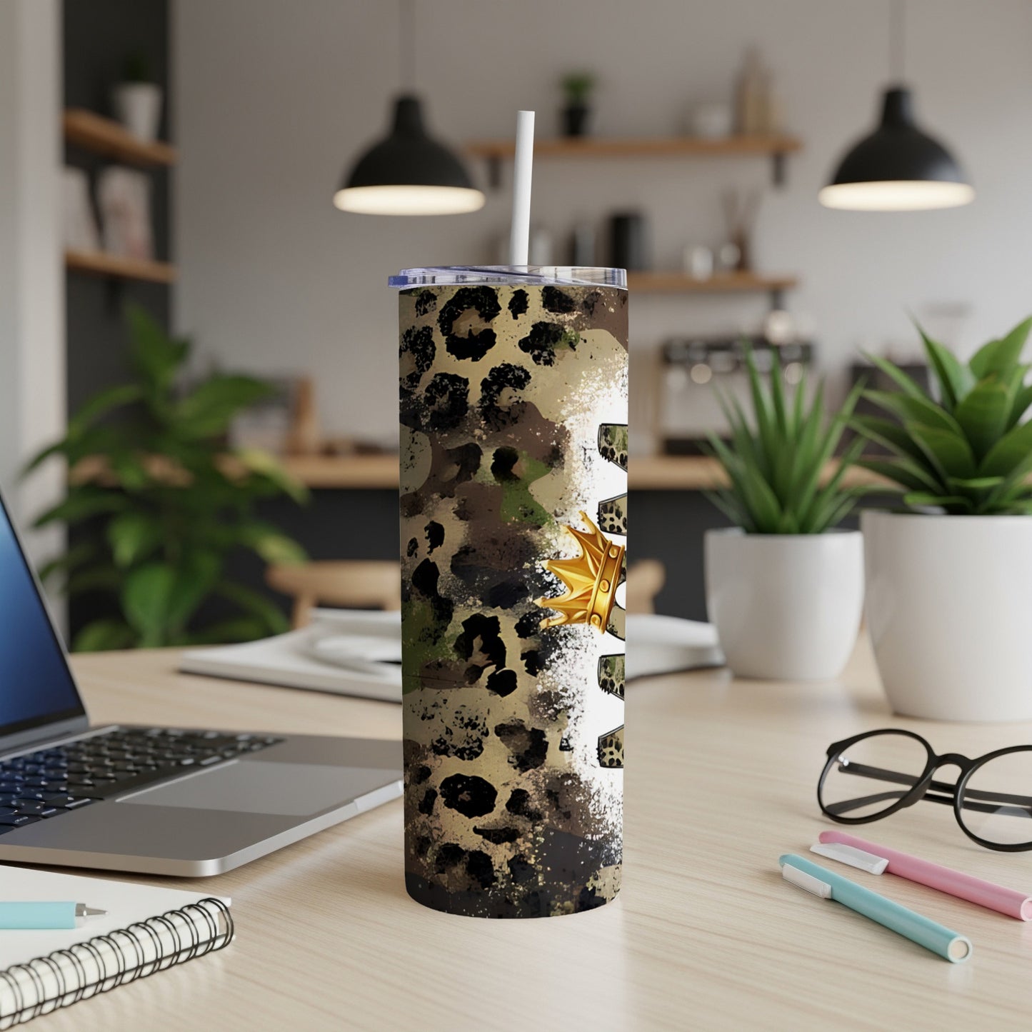 Leopard and camouflage tumbler with gold star detail.