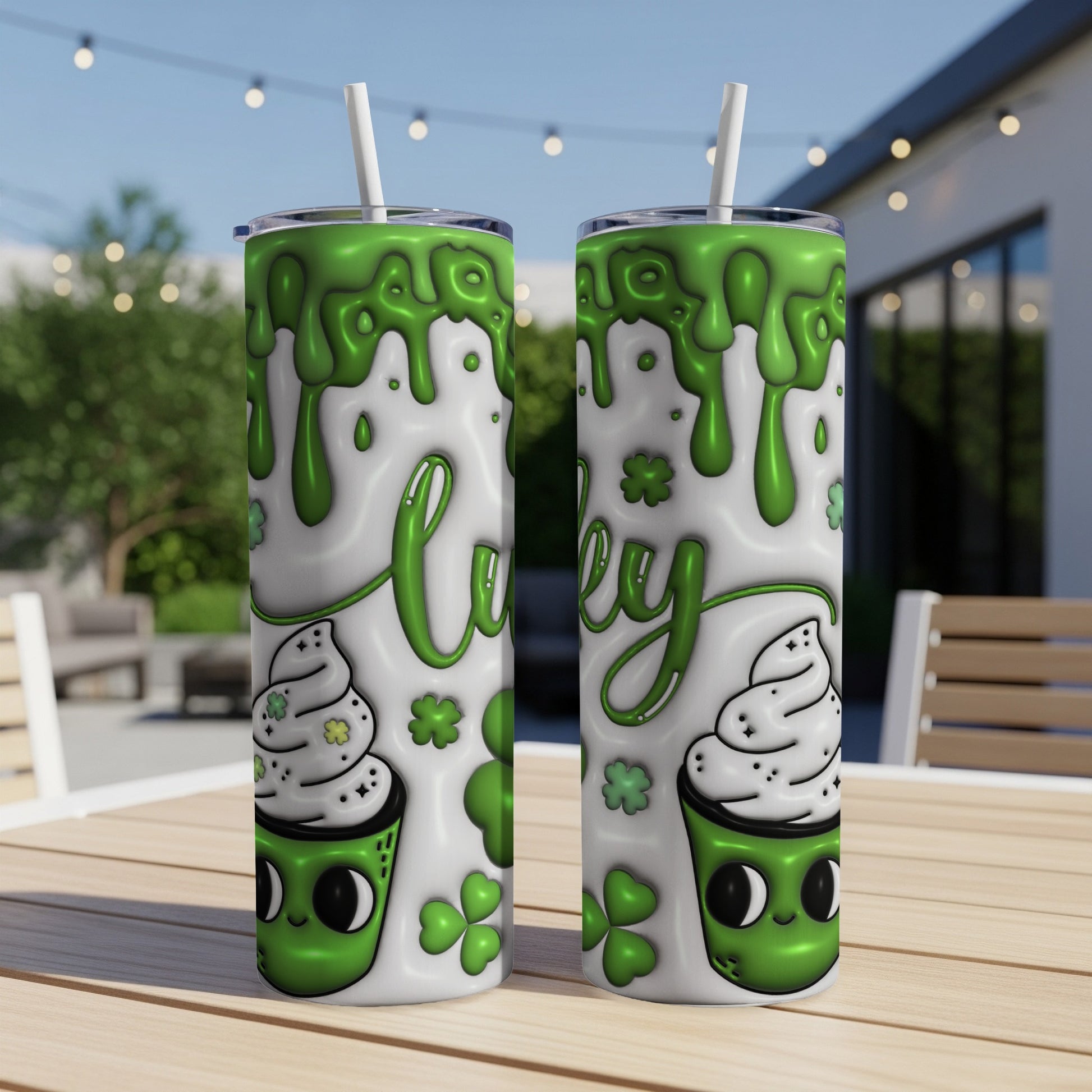 Two green St. Patrick's Day themed tumblers with shamrocks and "lucky" text.