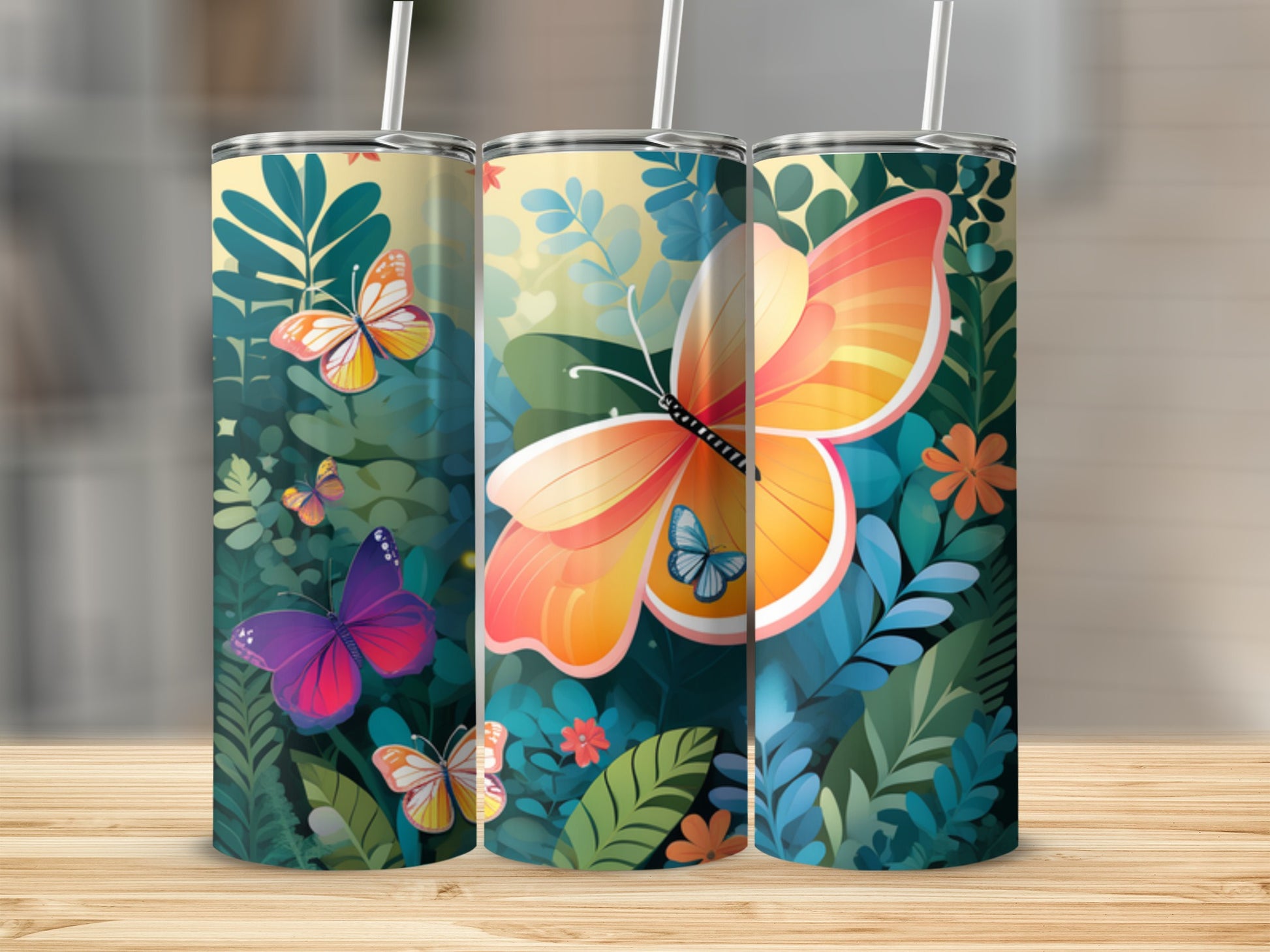 Three tumblers with butterfly and foliage designs.