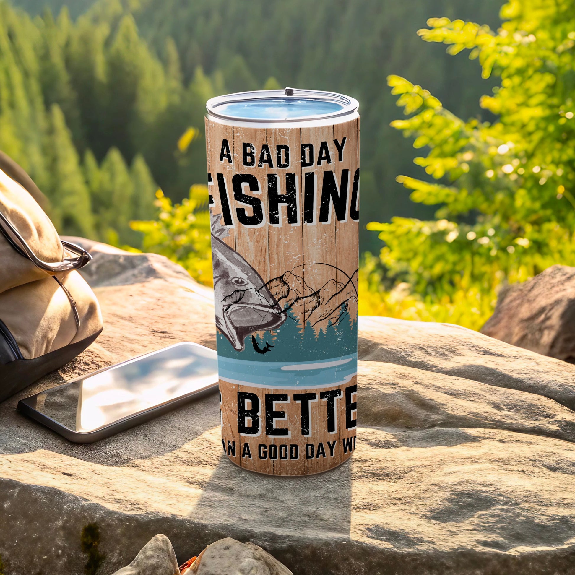 A Bad Day Fishing Better Than Good Day Tumbler product type
Tumbler, Fishing tumbler, Fisherman gift, Angler tumbler, Fish design, Outdoor drinkware, Lake fishing, River fishing, Mountains scenery, Forest backdrop, Rustic wood grain, Fishing quote, Humorous fishing, Dad gift idea, Birthday gift him, Travel mug, Insulated cup, Cold beverage, Hot beverage, Adventure gear