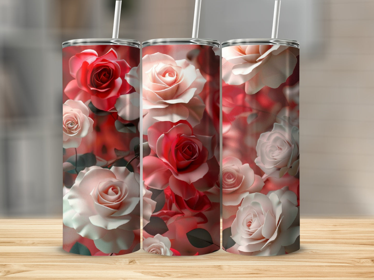 Three tumblers featuring a floral pattern of red and white roses.