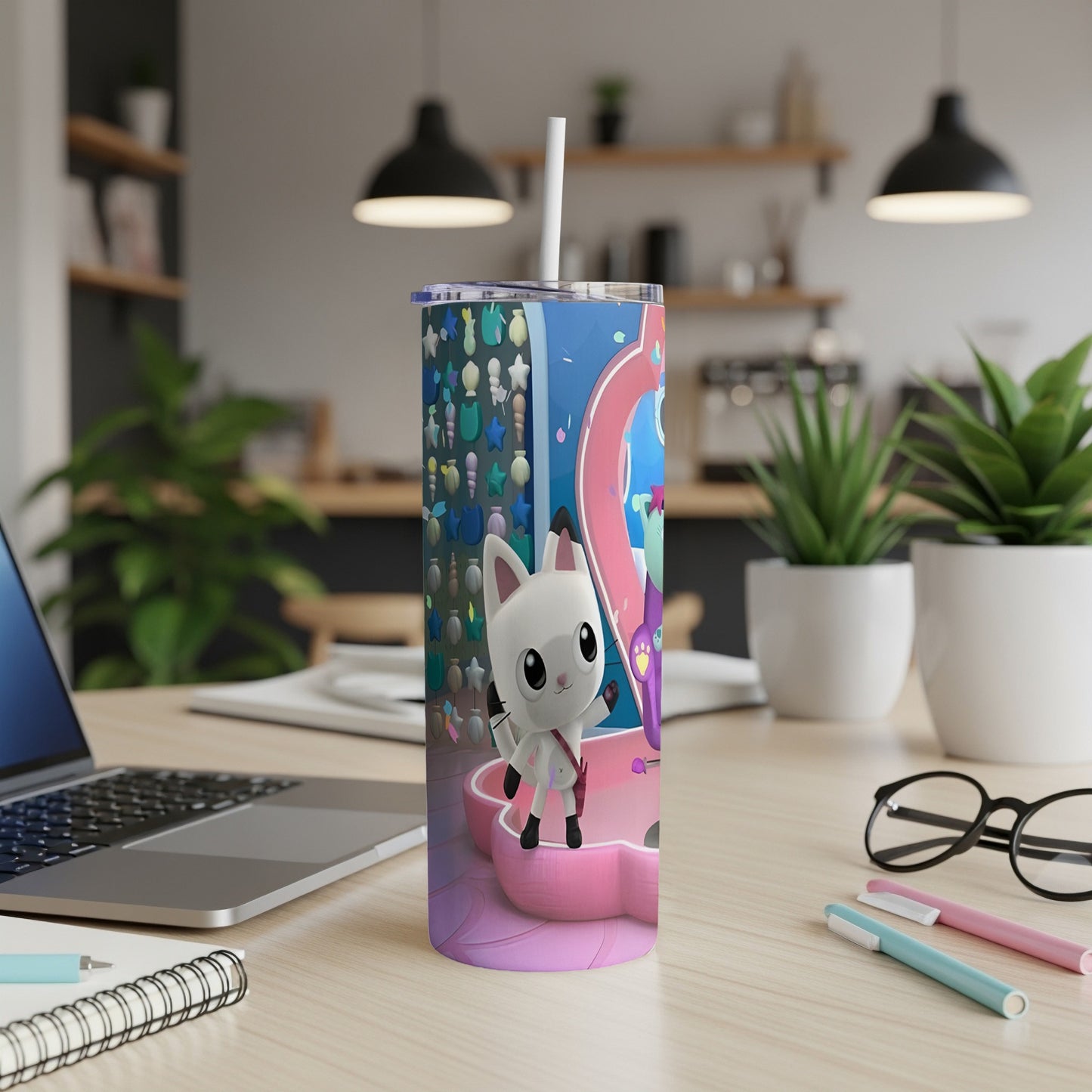 White cat character with colorful background on a white tumbler.