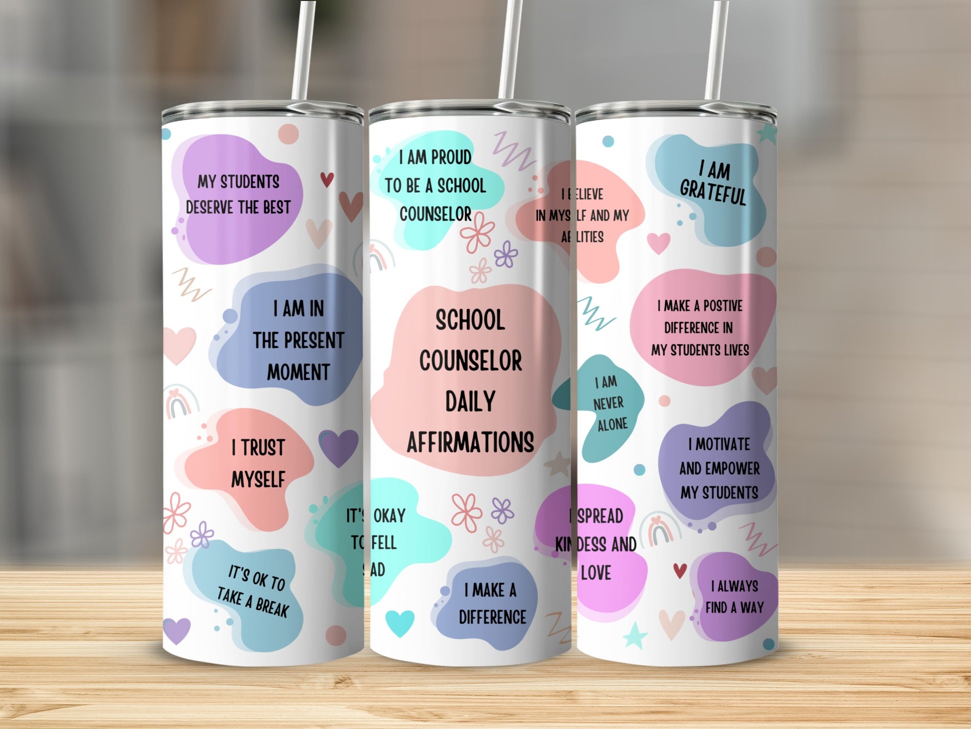 Three tumblers with affirmations for school counselors.