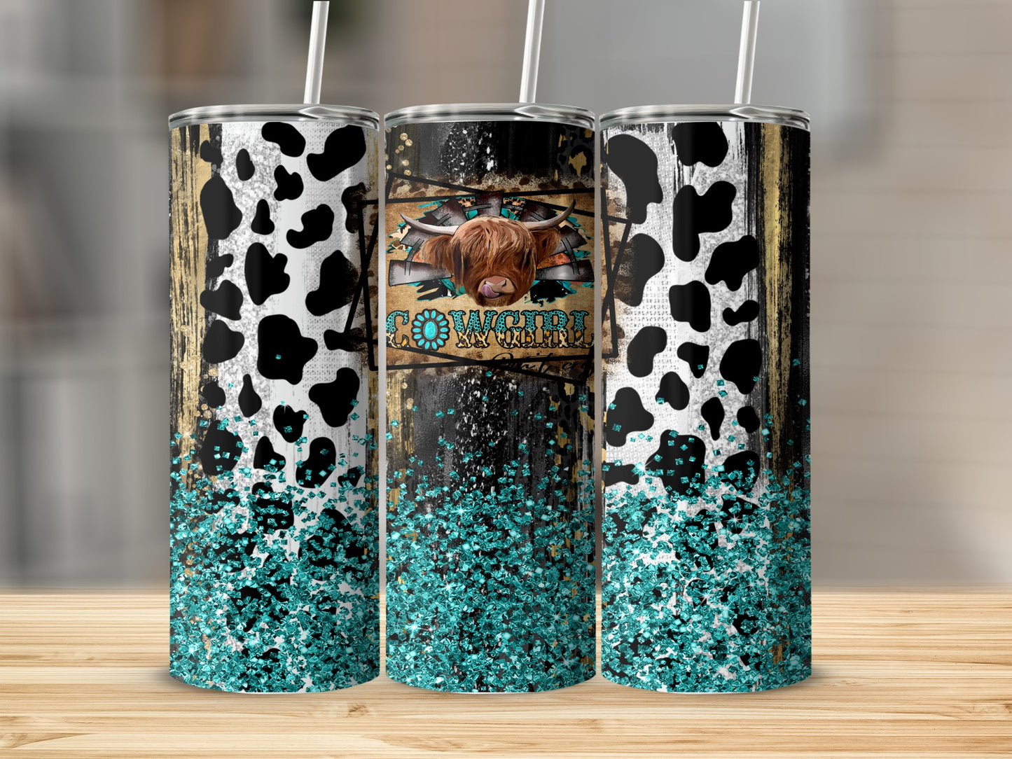 Cowgirl tumbler with cow print, wood grain, and glitter accents.