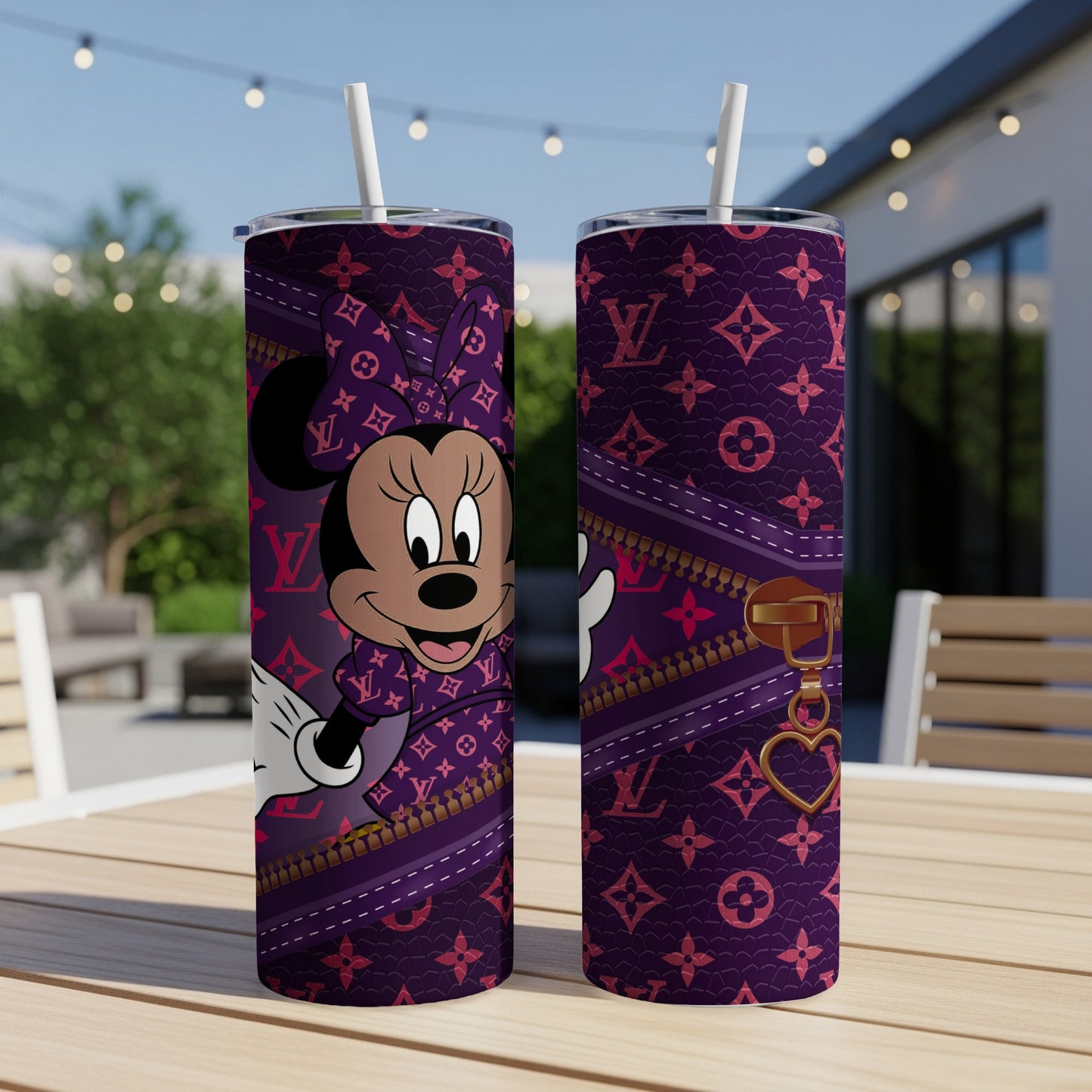 Minnie Mouse in purple LV-patterned dress and bow on a tumbler.