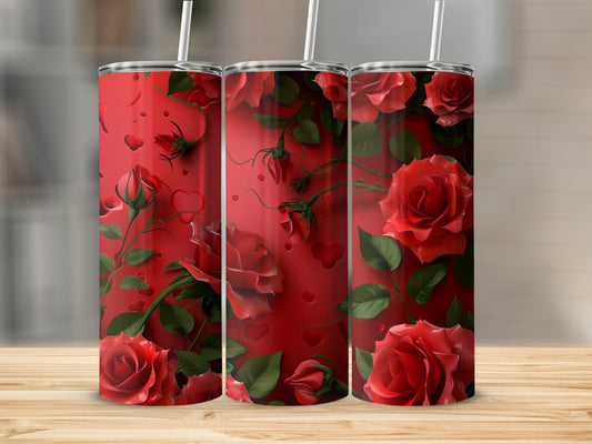 Three red rose tumblers with hearts and vines on a wooden surface.