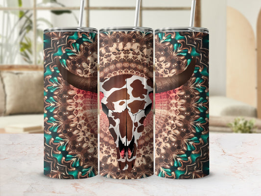 Cow skull with mandala pattern on cylindrical tumblers.