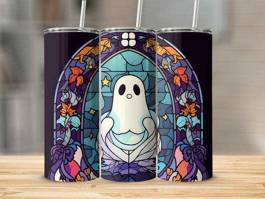 Stained glass ghost with stars and leaves on a tumbler.