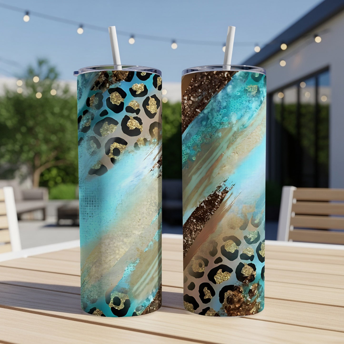 Two tall tumblers with leopard print, turquoise, and gold brushstroke designs.