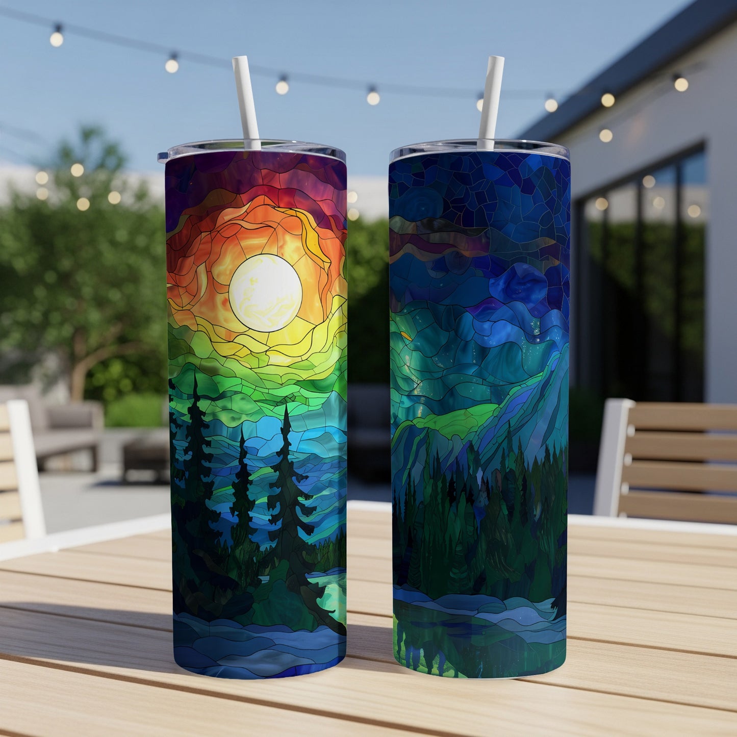 Two stained-glass style tumblers with nature scenes: sunset forest and moonlit mountains.