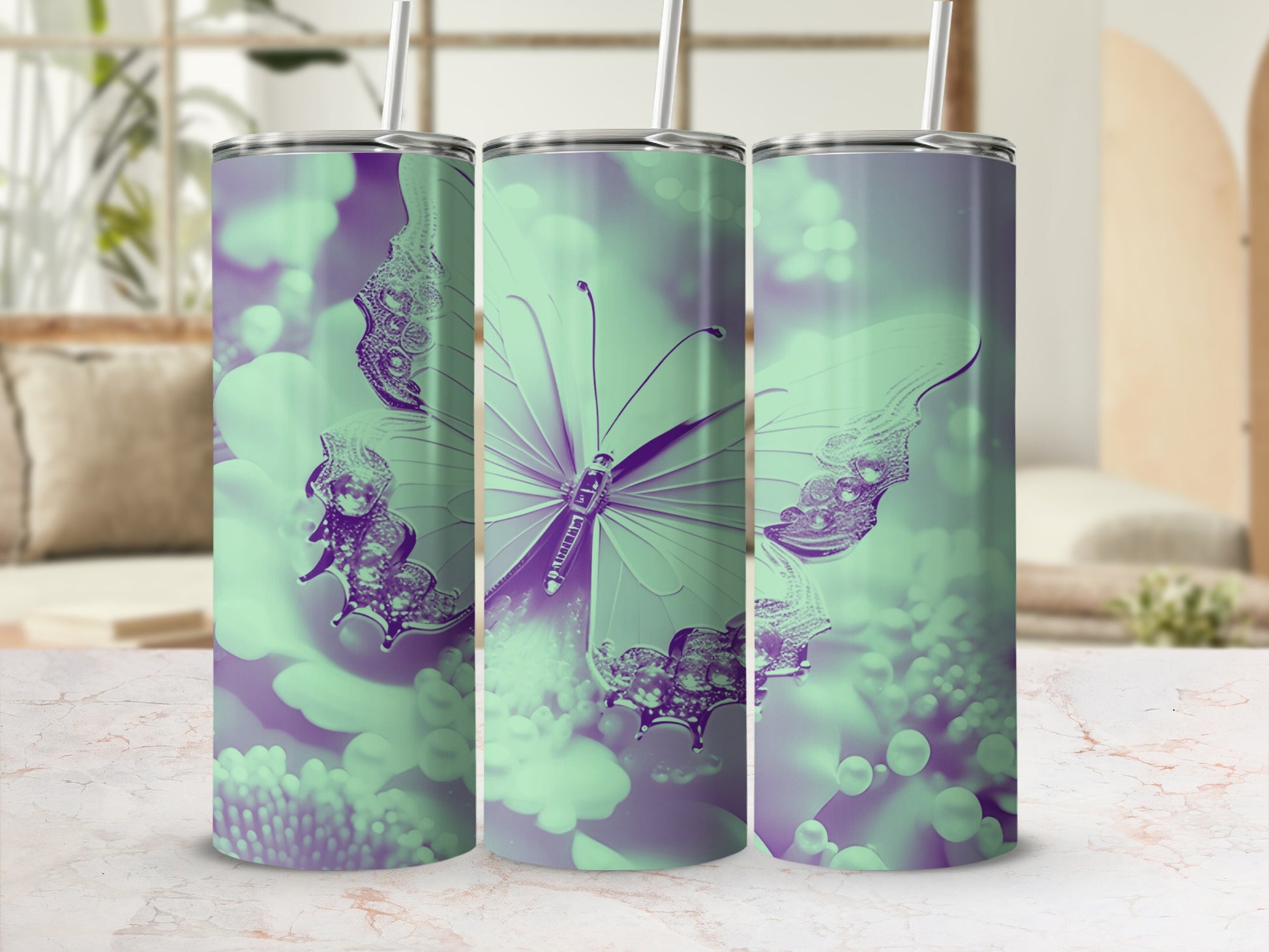 Green and purple butterfly and floral design on three tumblers.