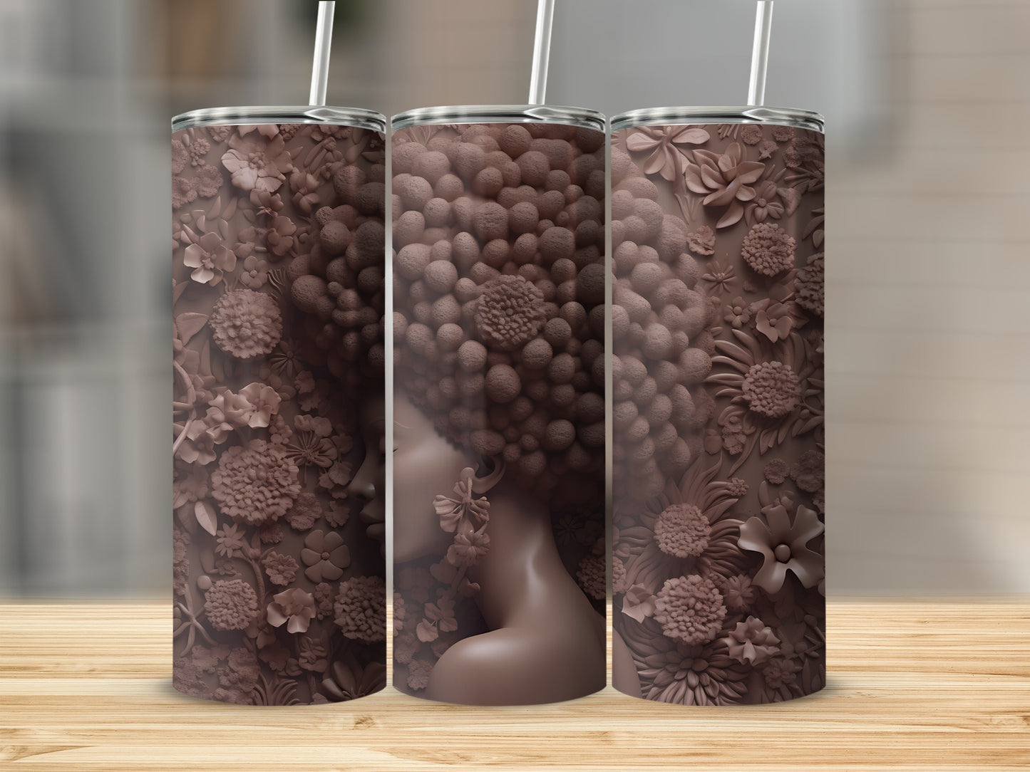 Brown tumbler with floral textured afro and profile of a woman.