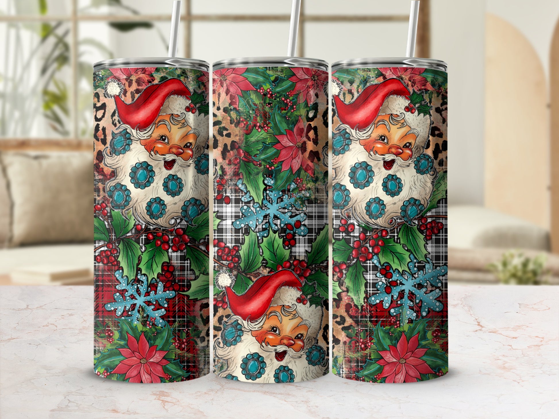 Three Santa Claus tumblers with leopard print, poinsettias, and snowflakes.