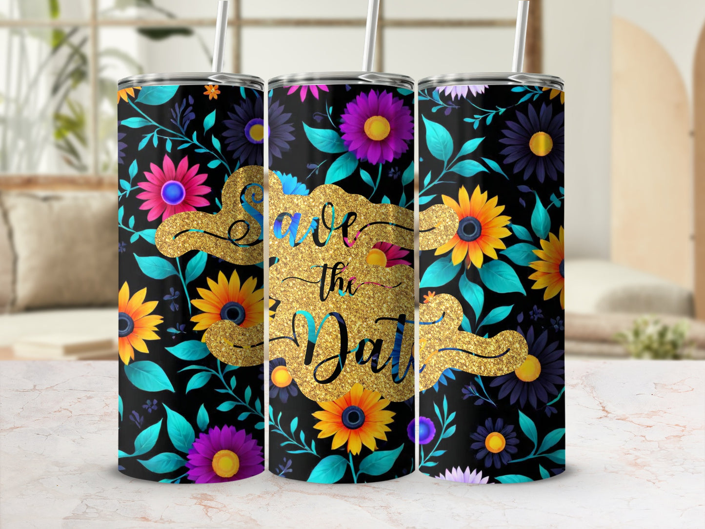 Black tumbler with "Save the Date" in gold glitter surrounded by colorful floral designs.