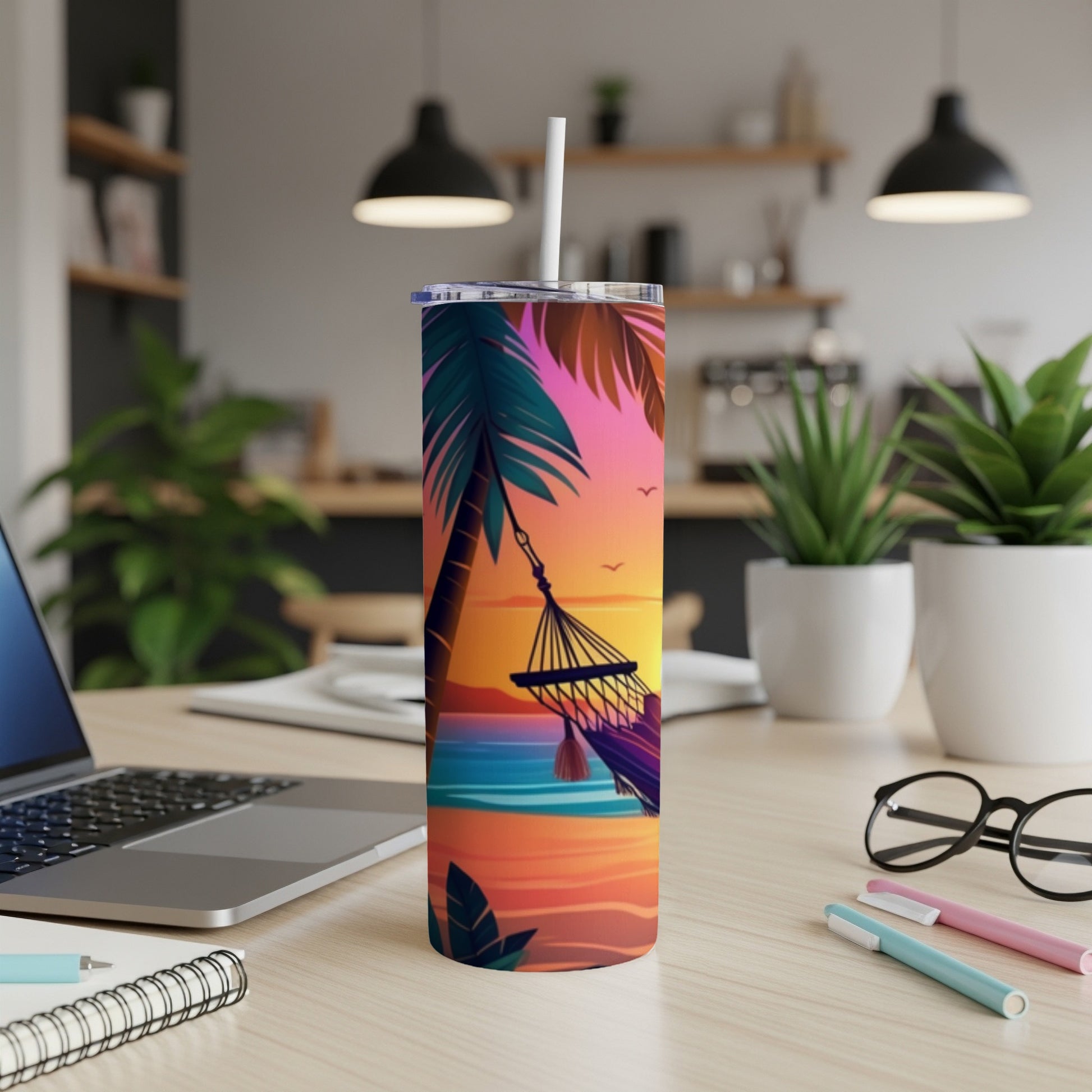 Beach sunset with hammock on a tropical palm tree, beside a tumbler.