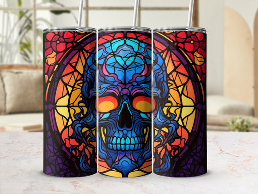 Colorful stained glass skull tumbler with straw.