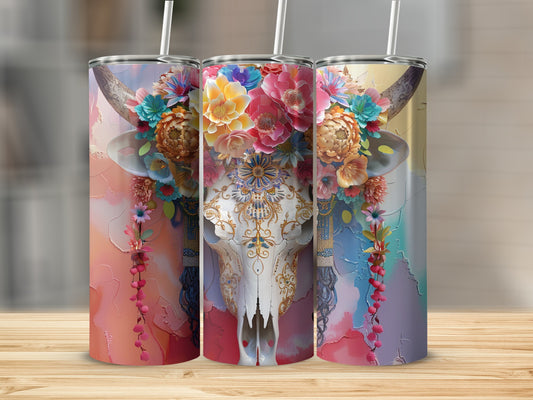 Floral embellished skull tumbler with colorful background.