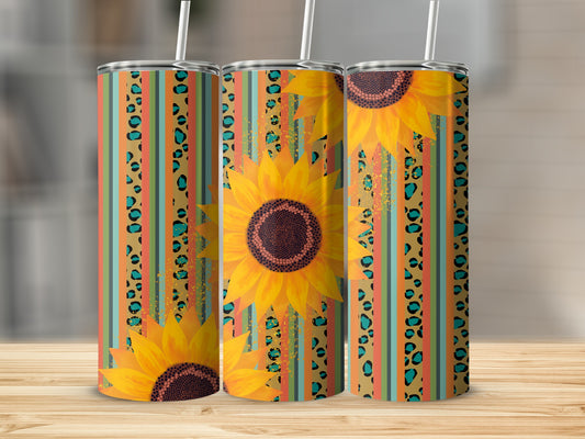 Three tumblers with sunflower and striped patterns.