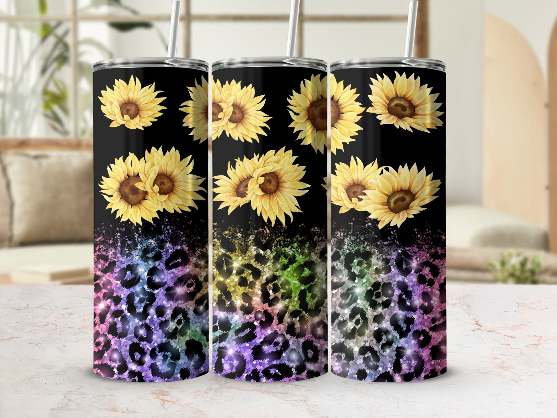 Three tumblers with sunflowers and a leopard print pattern.