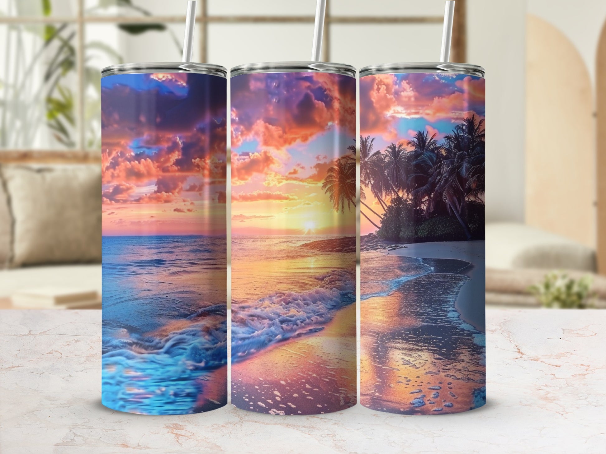 Three tumblers with a sunset beach scene and palm trees.