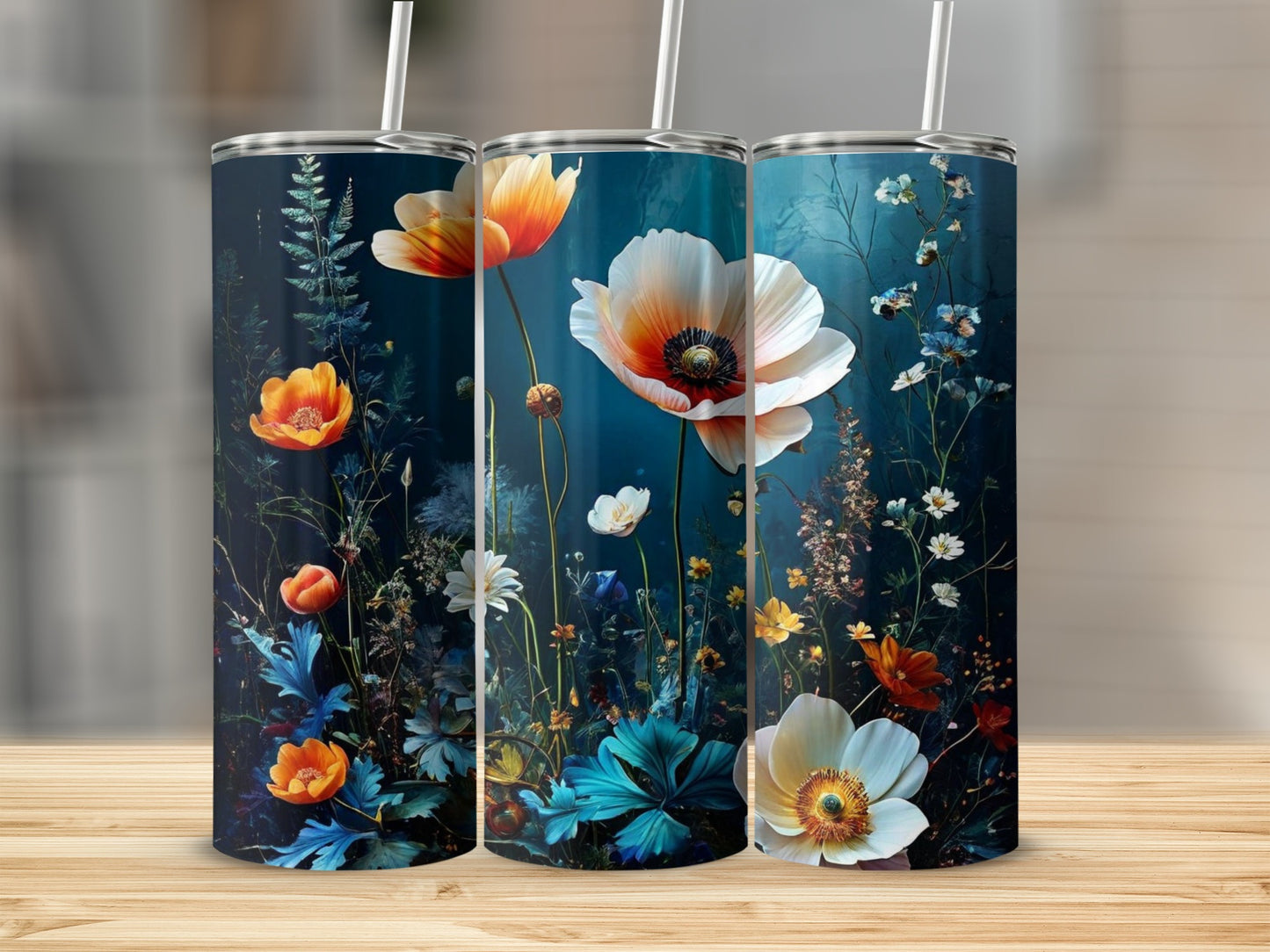 Three tumblers with a dark floral design featuring poppies and other wildflowers.
