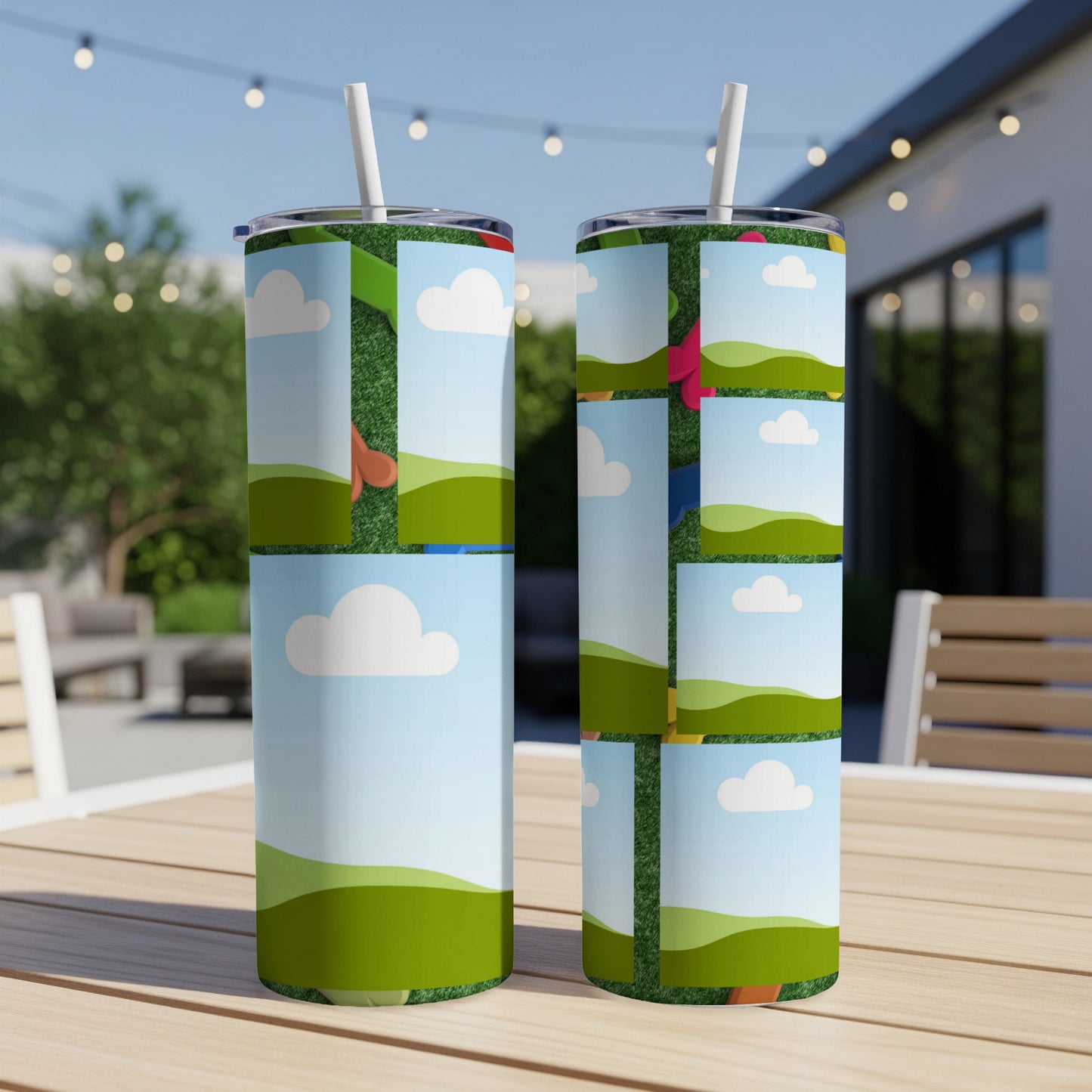 Two tumblers with a collage of cartoon clouds, green hills, and grass backgrounds.