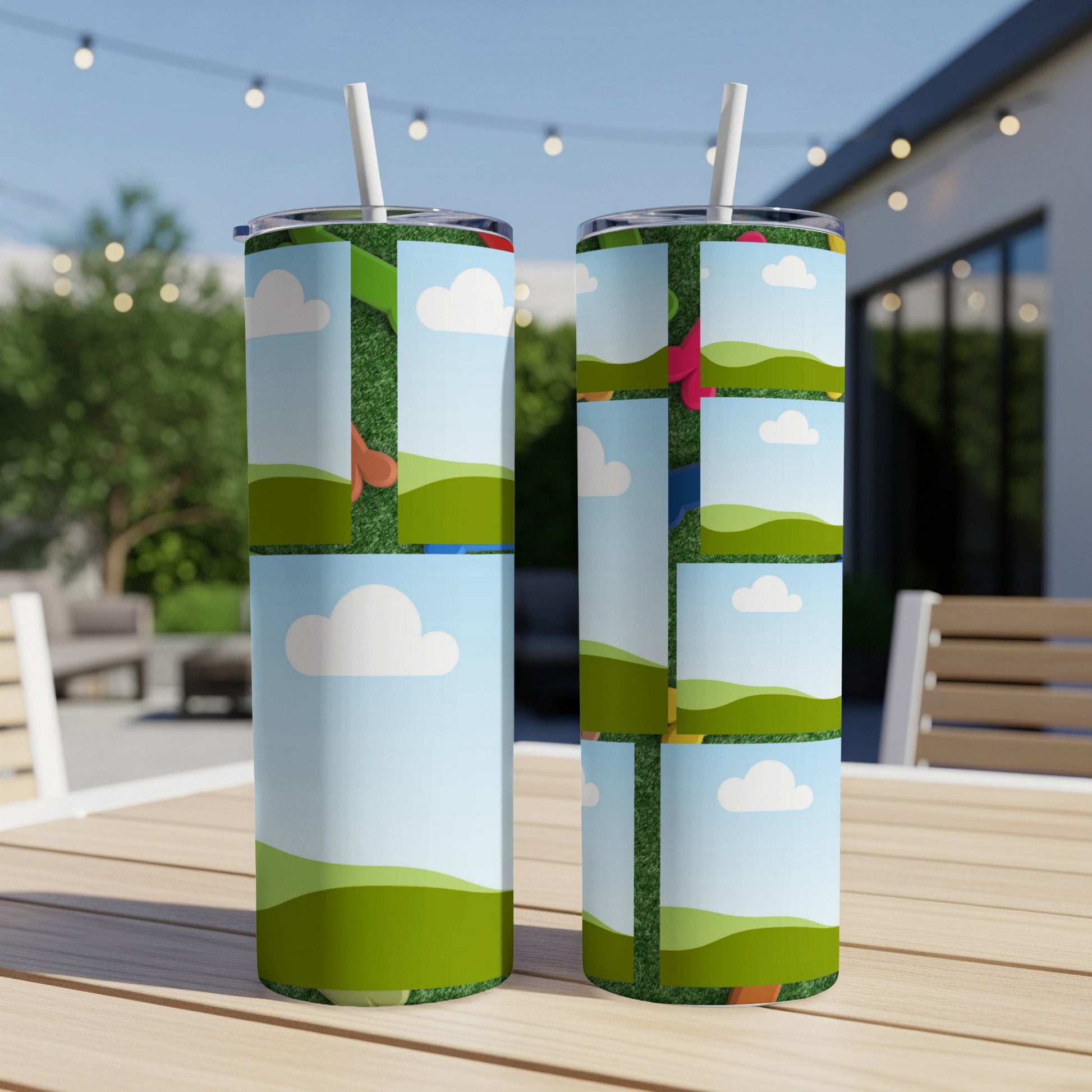 Two tumblers with a collage of cartoon clouds, green hills, and grass backgrounds.
