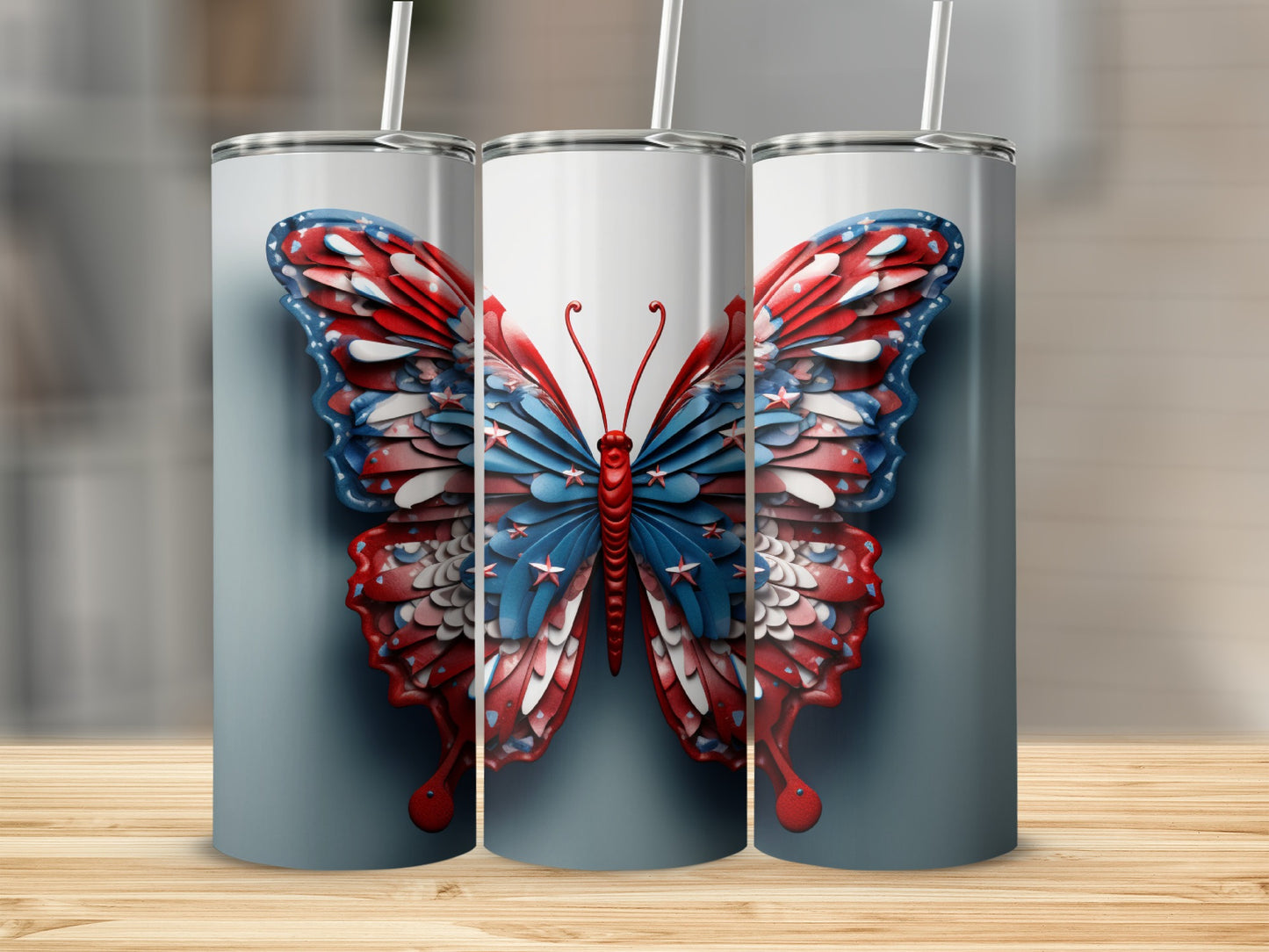 Three tumblers with patriotic butterfly designs featuring red, white, and blue stars and stripes.