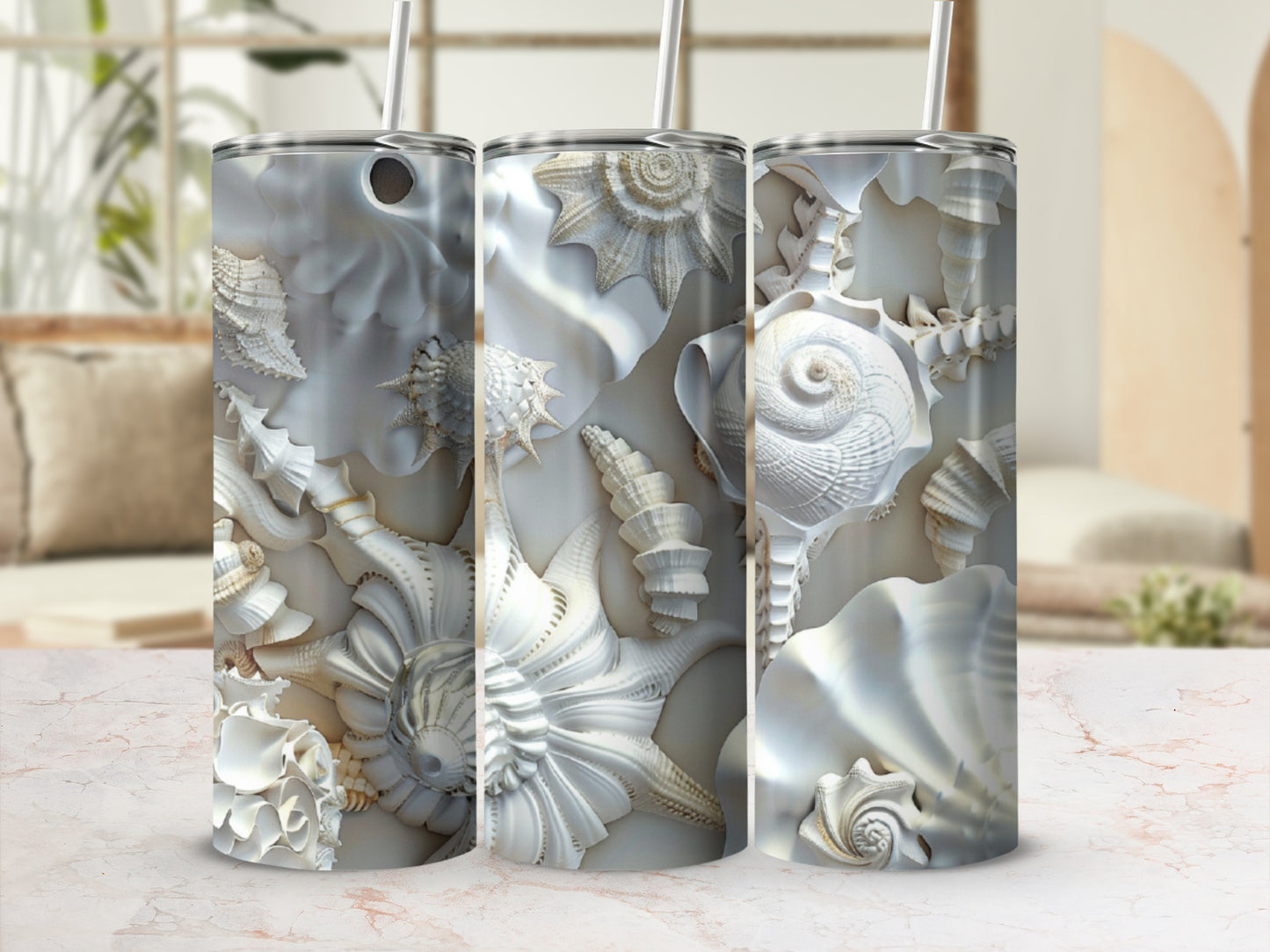 Seashell pattern on a tall, cylindrical tumbler with straw.