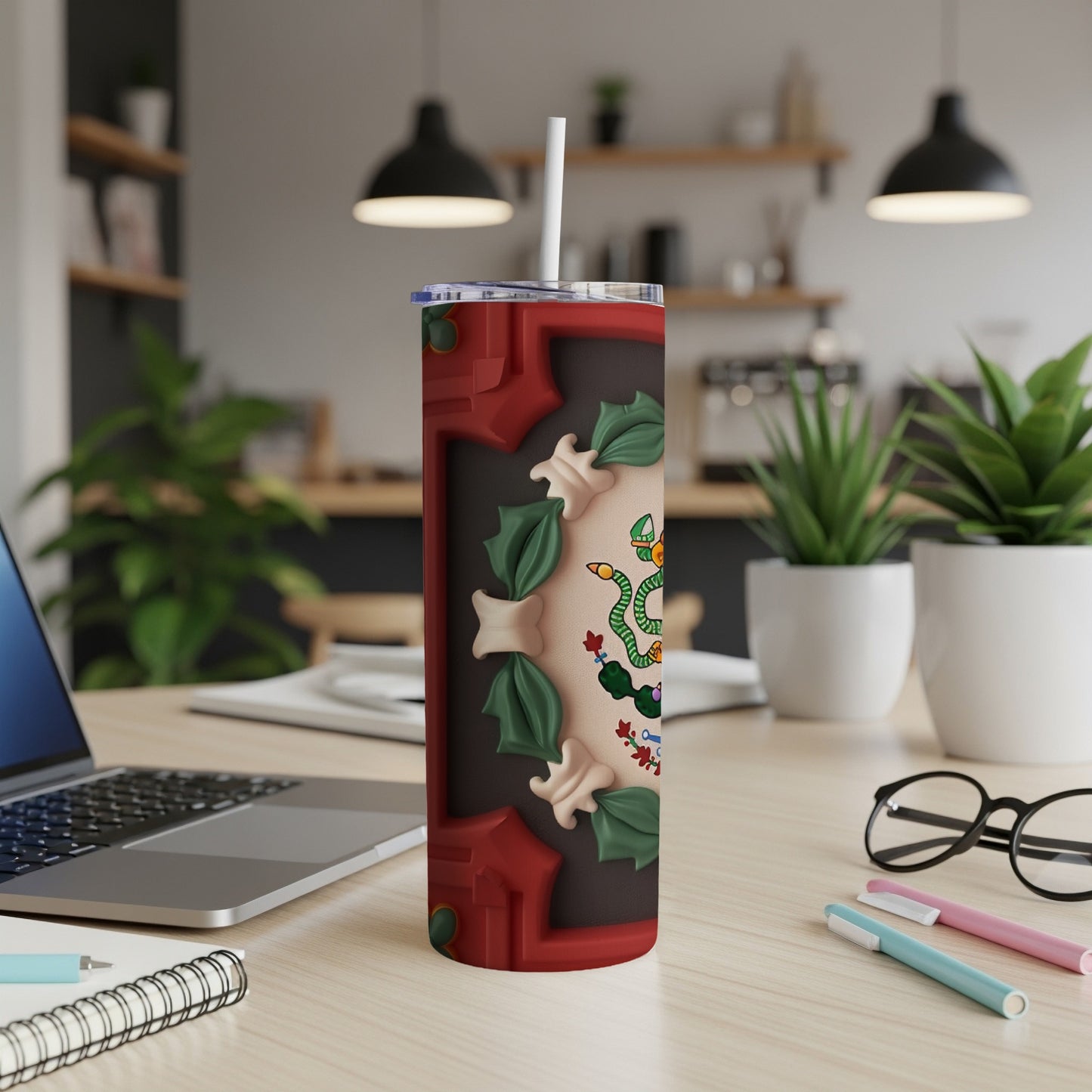 Red and green Christmas-themed tumbler with a coiled snake design.