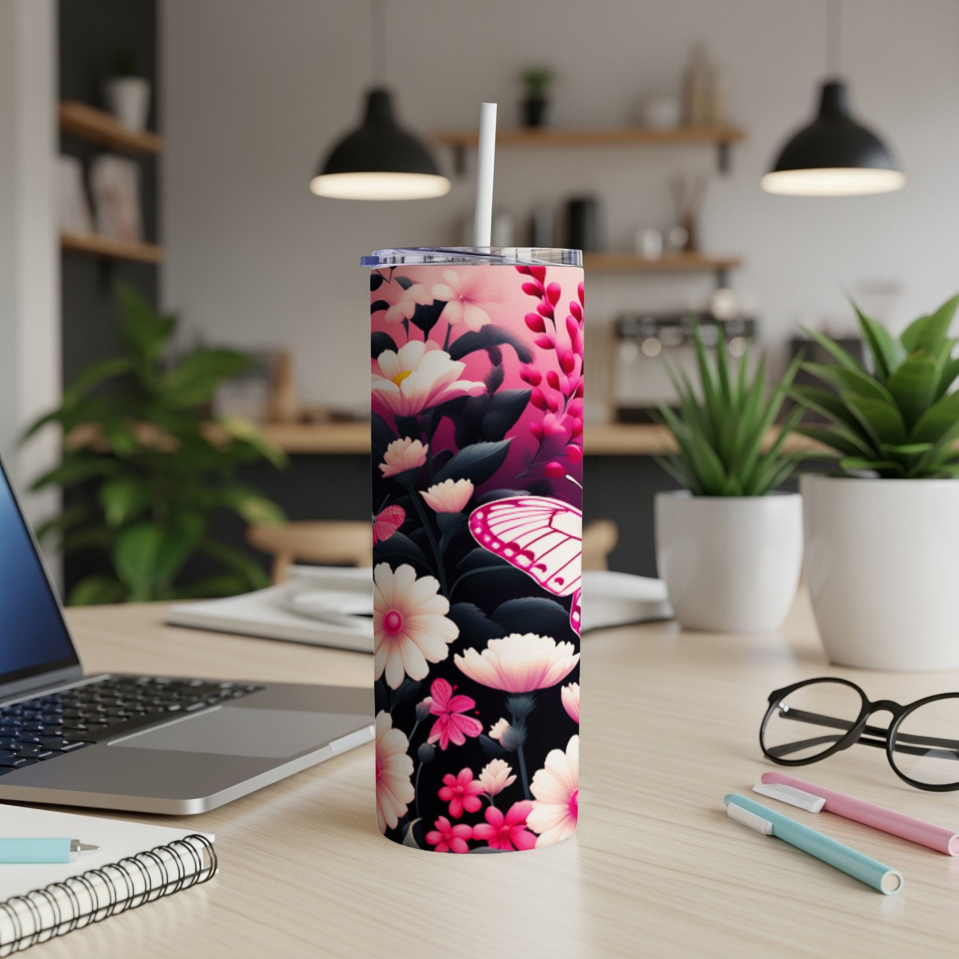 Pink and white floral pattern tumbler with a white butterfly.
