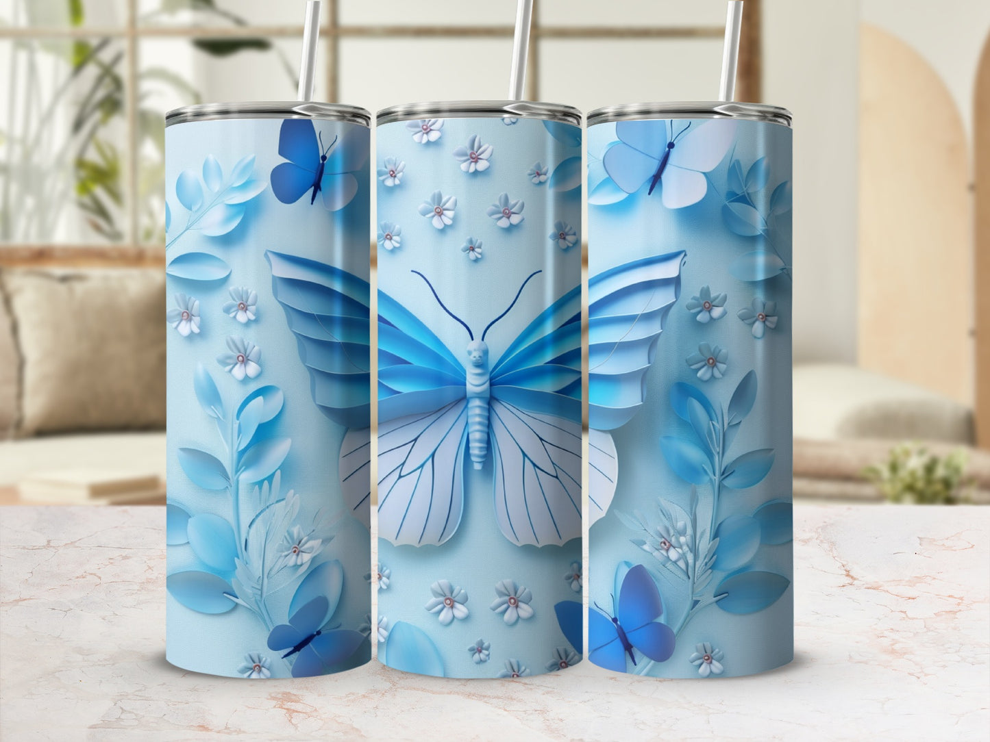 Light blue tumbler with large butterfly and floral design.