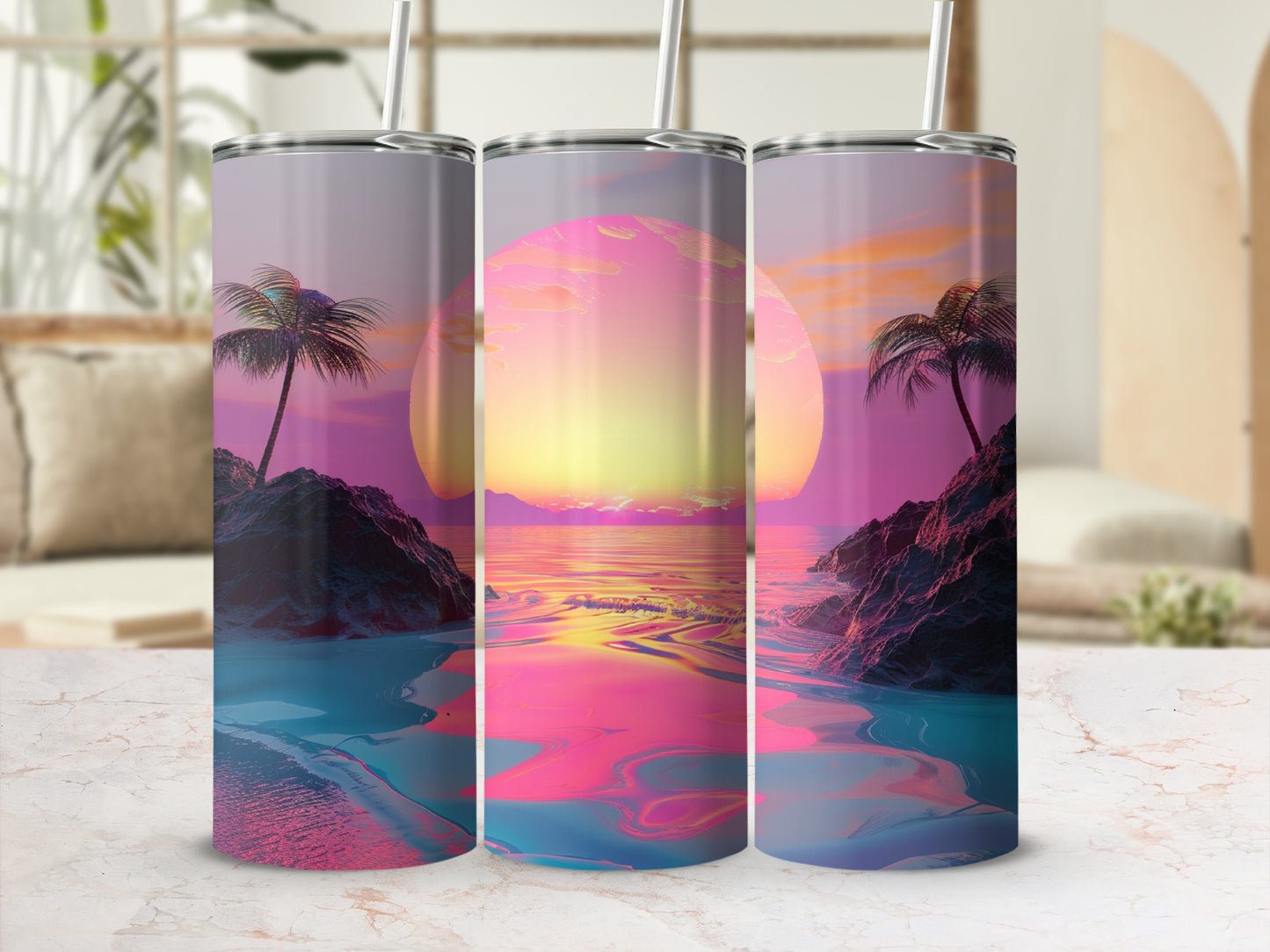 Three tumblers with a sunset beach scene and palm trees.