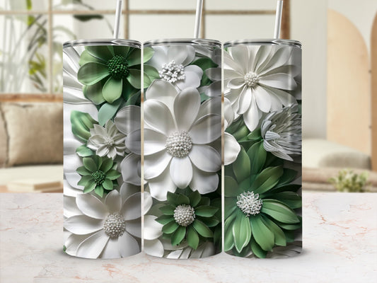 Three tumblers with layered white and green floral designs.