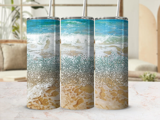 Ocean waves and sand design on three tumblers.