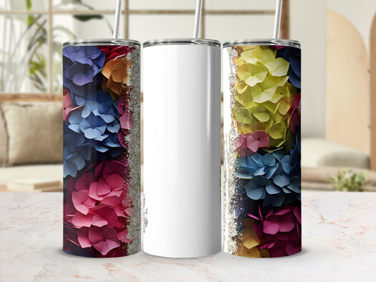 Three tumblers with floral and glitter designs, one blank white.