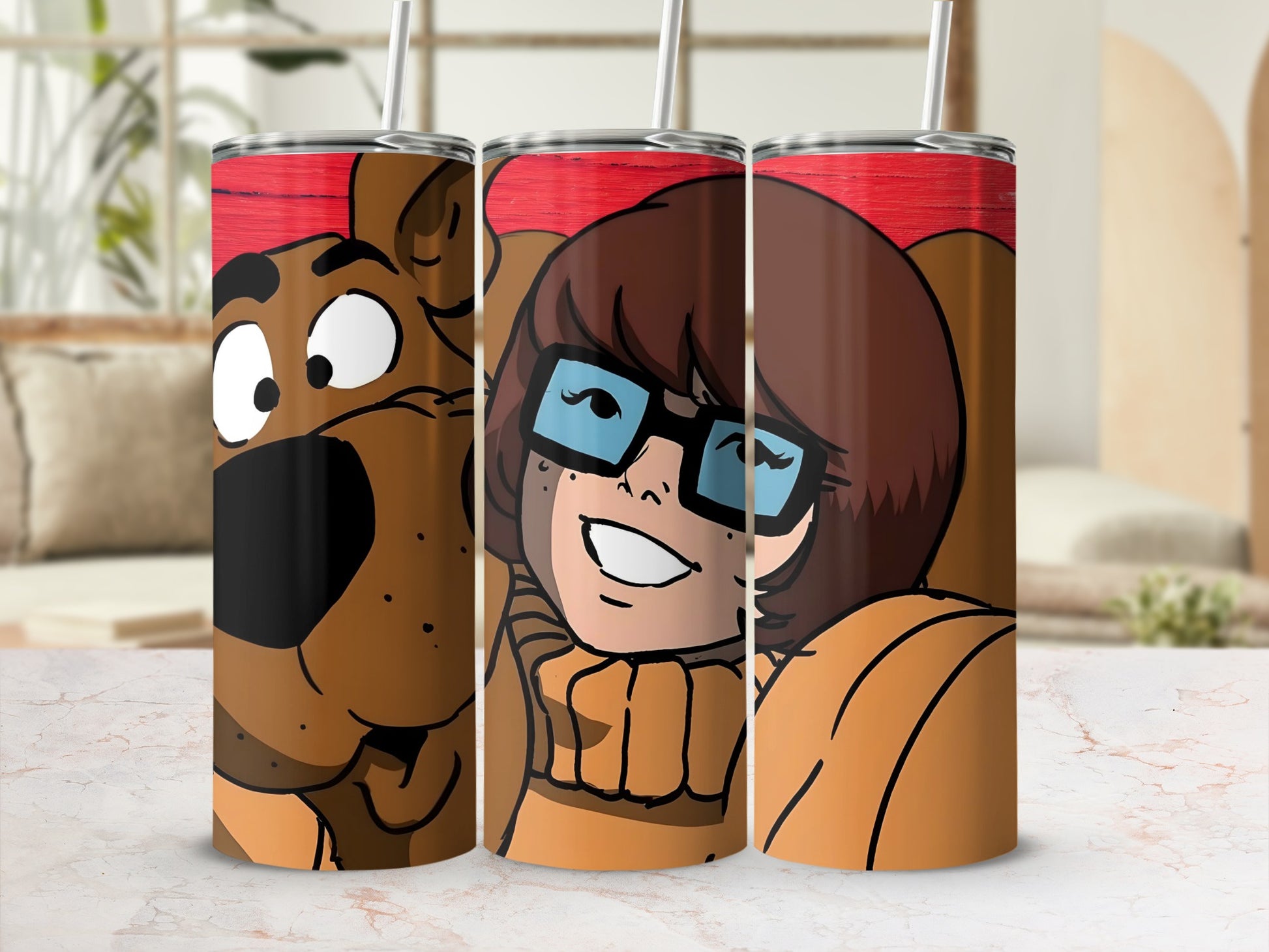 Scooby-Doo and Velma graphic on three red tumblers.