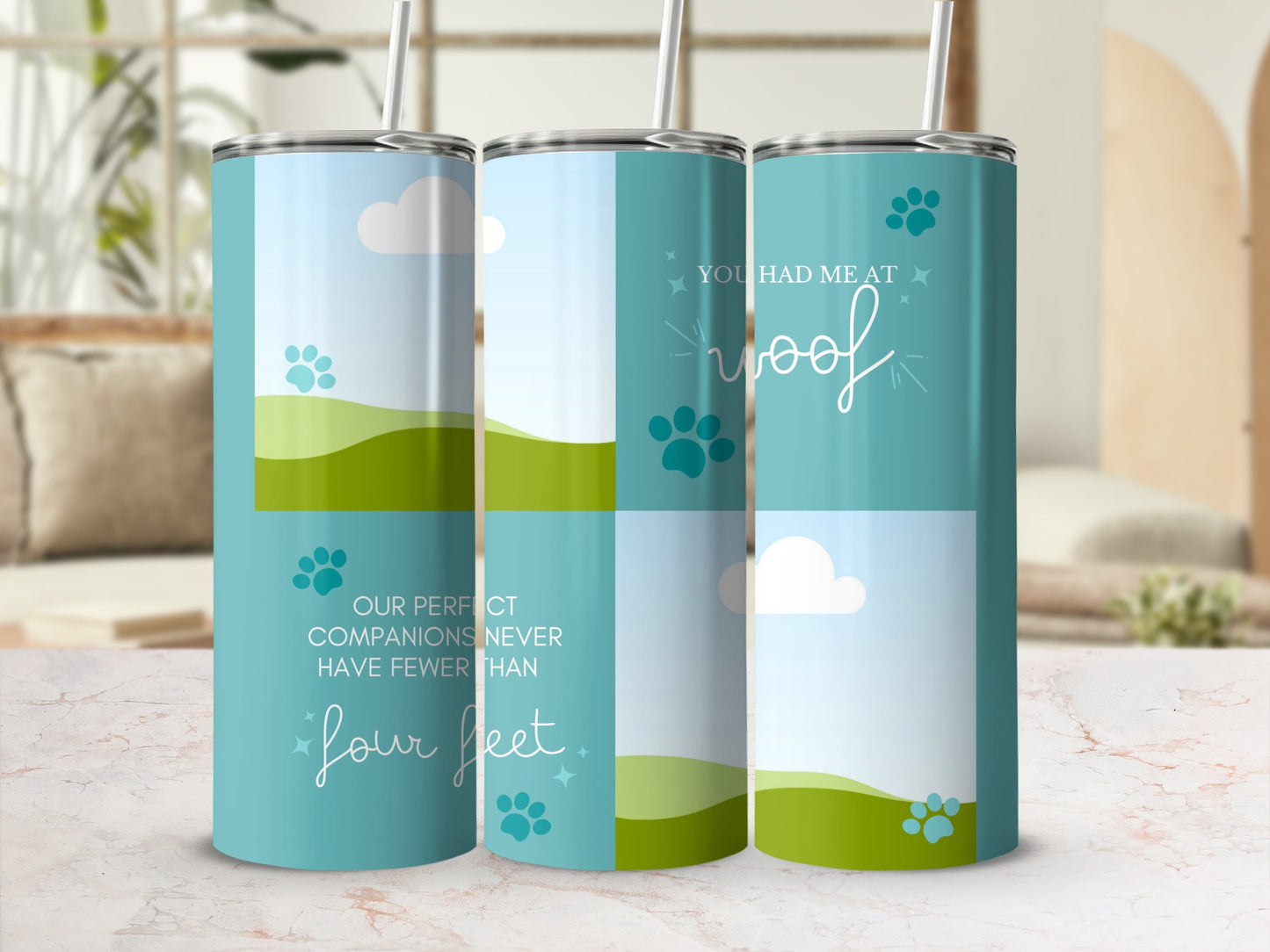 Three tumblers with dog-themed designs featuring paw prints, clouds, and text.