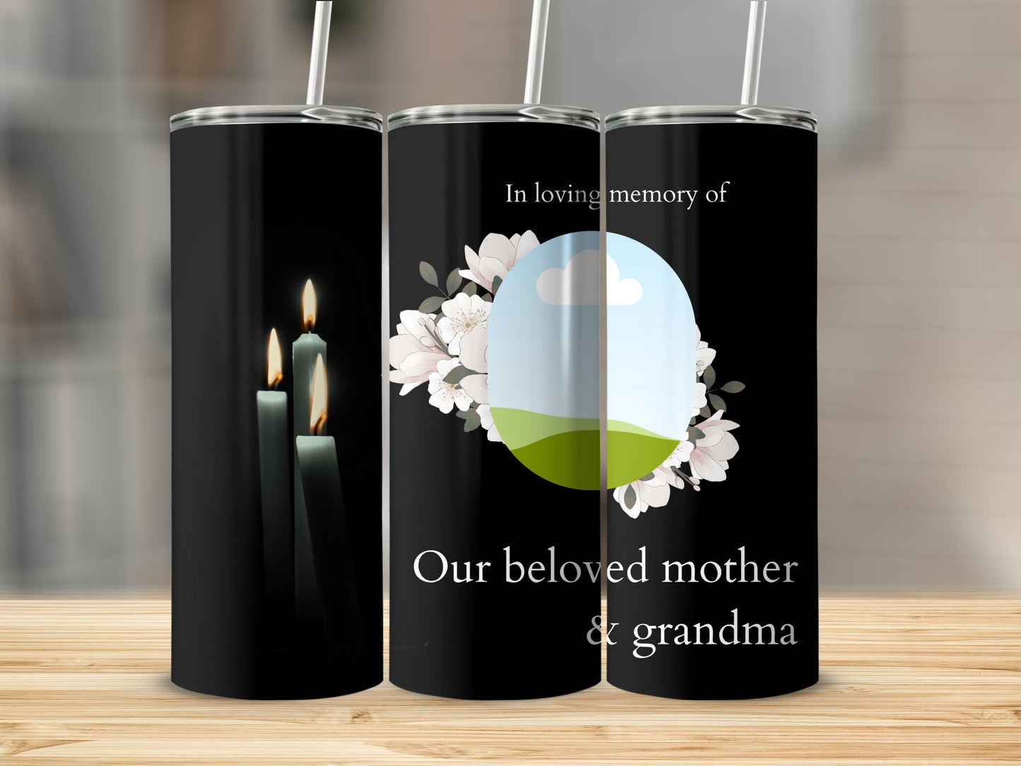 Memorial tumbler with lit candles and text "In loving memory of Our beloved mother & grandma".