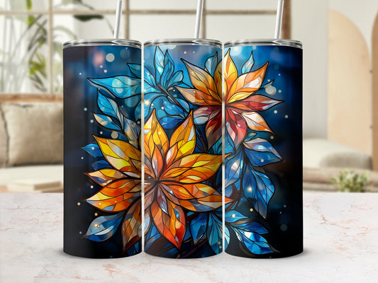 Three tumblers with a stained glass floral design on a blurred background.