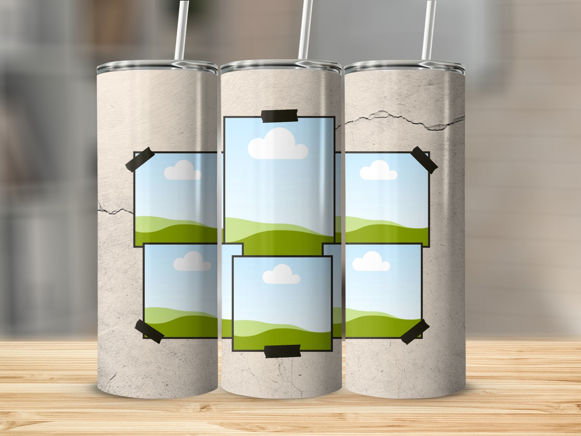 Three tumblers with a cracked concrete texture and taped-on photo frames of clouds and hills.