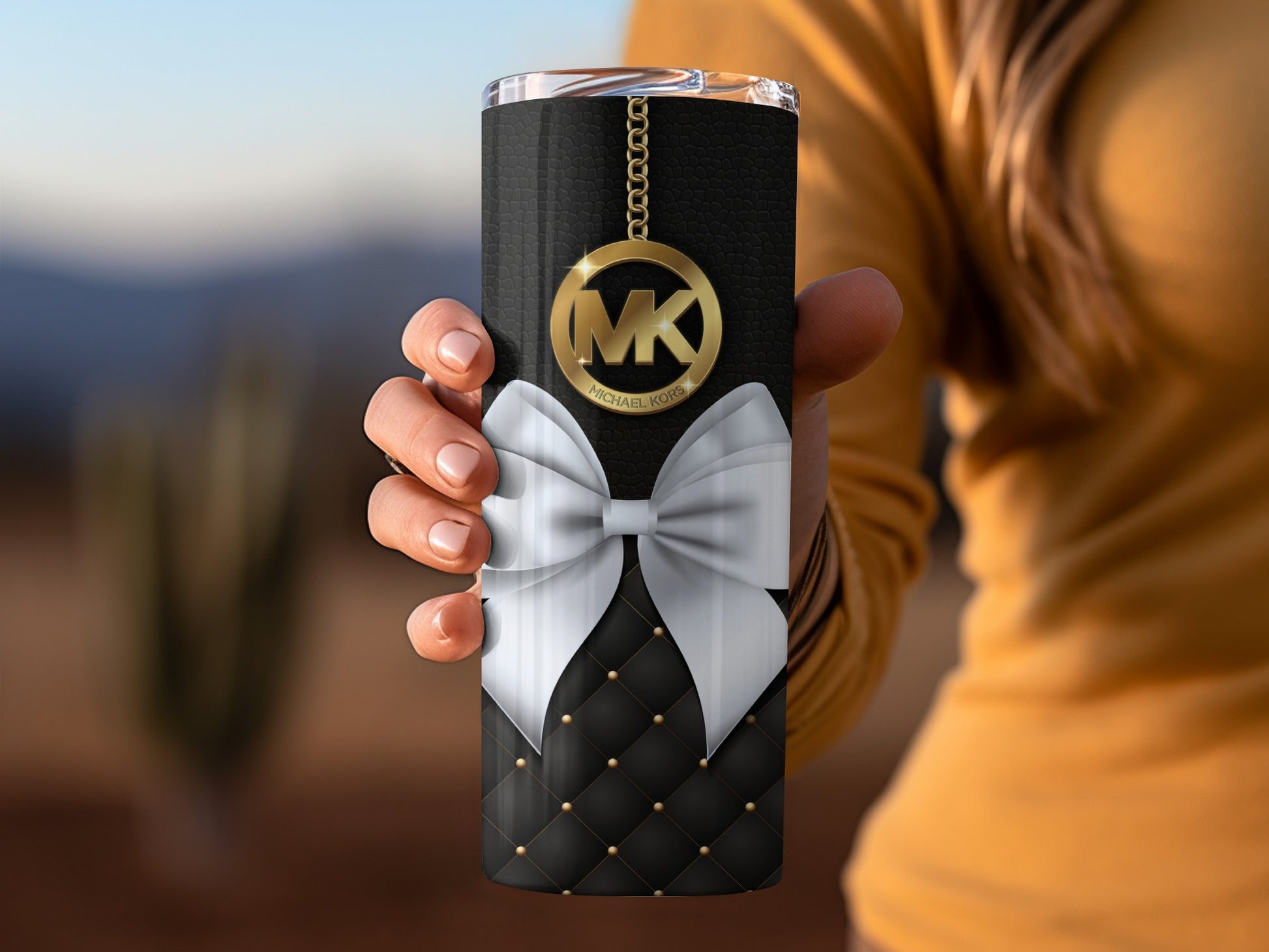 Elegant Black Quilted Tumbler with MK Gold Pendant Design