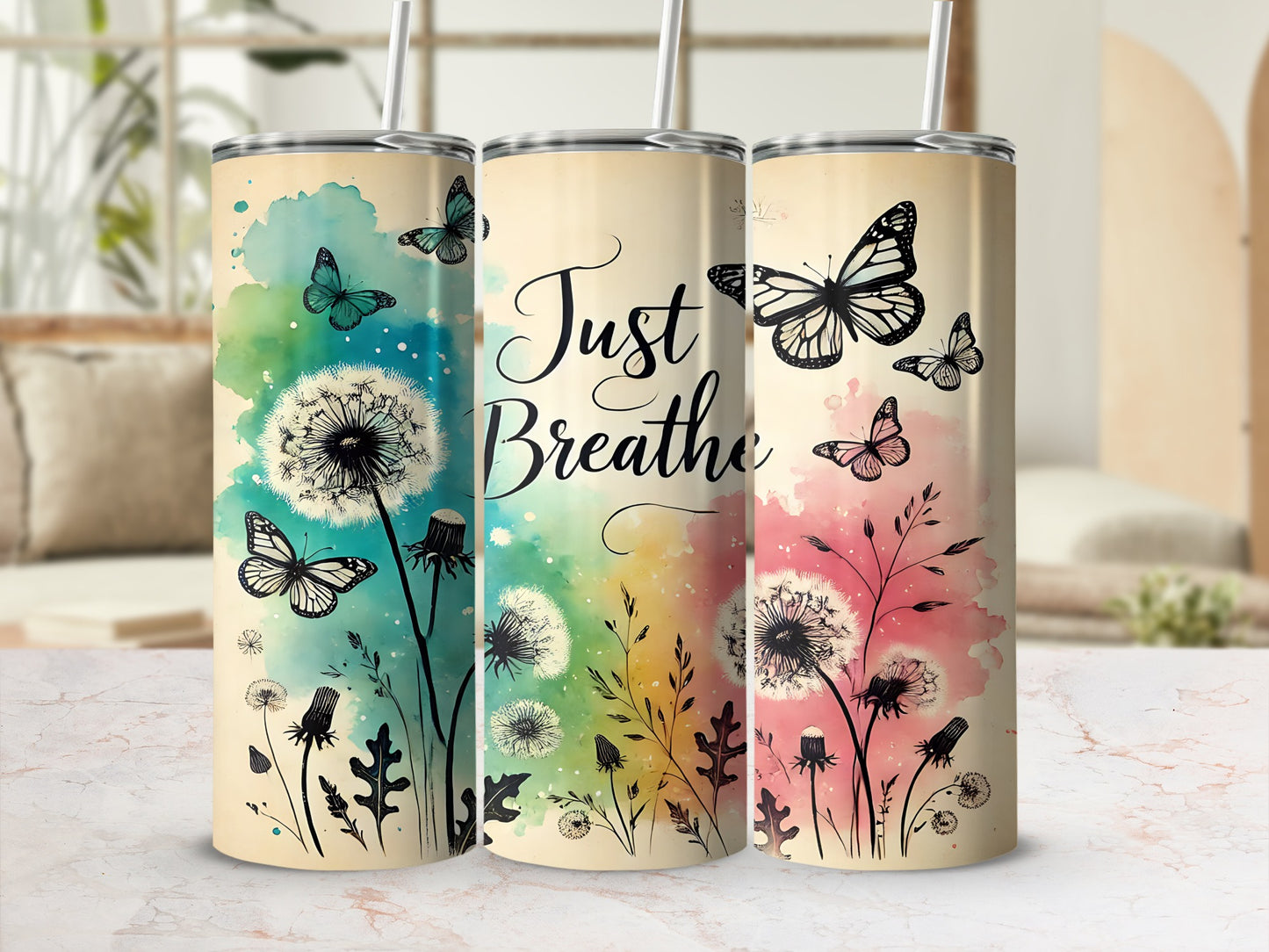 Three tumblers with dandelion and butterfly designs and "Just Breathe" text.