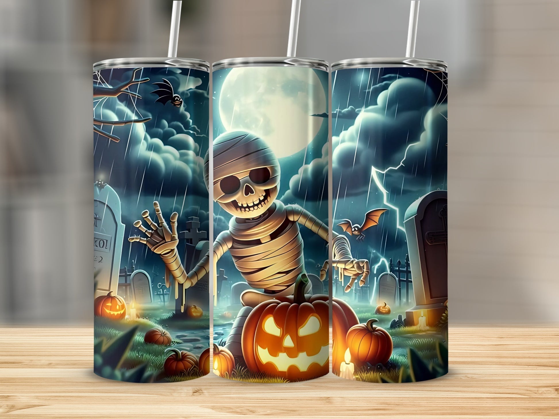 Mummy Halloween tumbler design with pumpkins, tombstones, and stormy night sky.