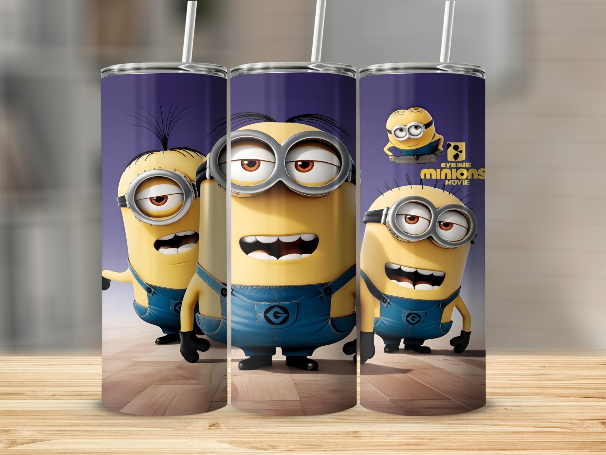 Three Minions from the movie "Minions" on a wooden surface.