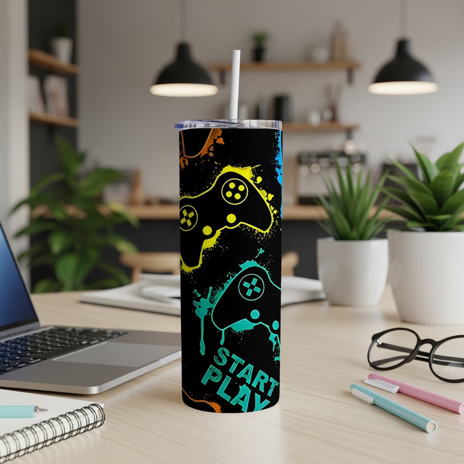 Black tumbler with colorful game controller graphics and "START PLAY" text.