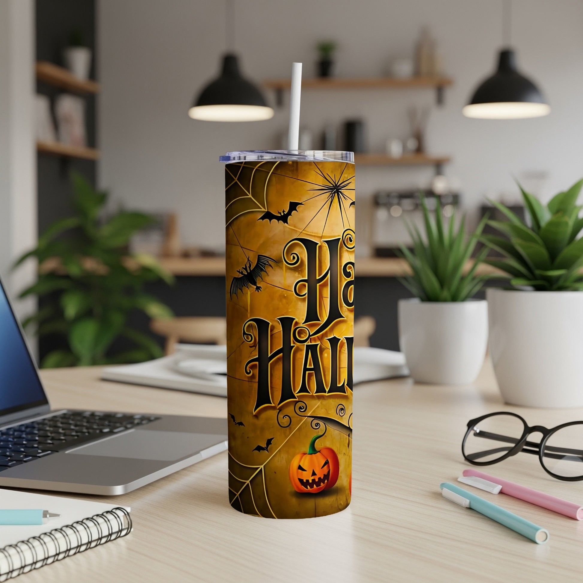 Tall tumbler with "Happy Halloween" text, bats, spiderwebs, and a jack-o'-lantern.