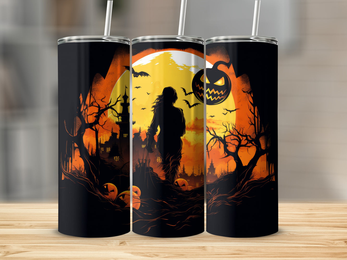 Halloween themed tumblers with spooky landscape, jack-o'-lanterns, and bats.