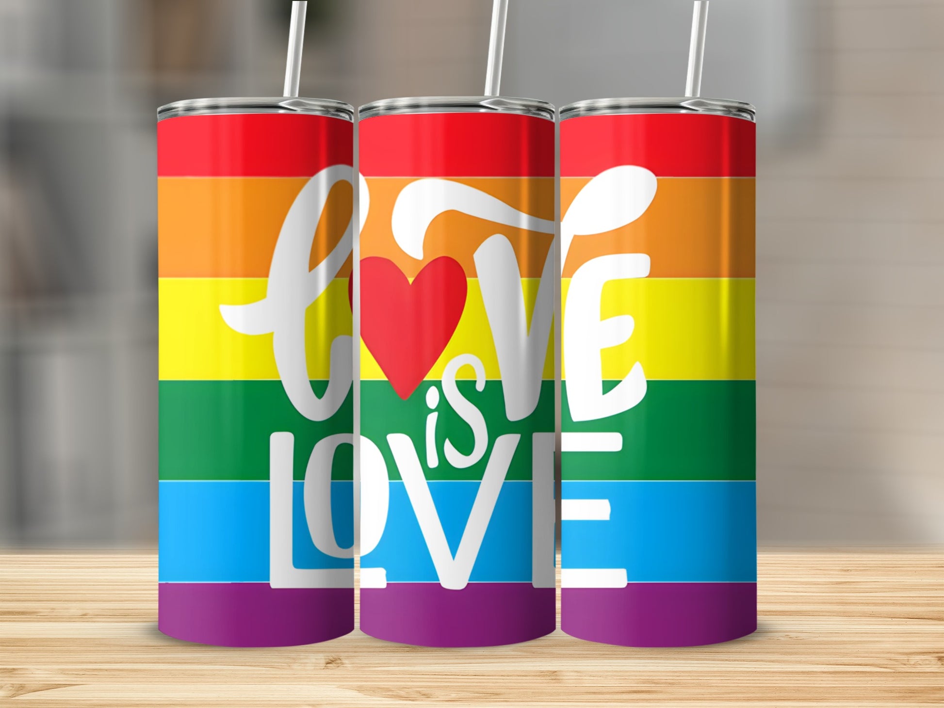 Rainbow tumbler with "Love is Love" and a heart.